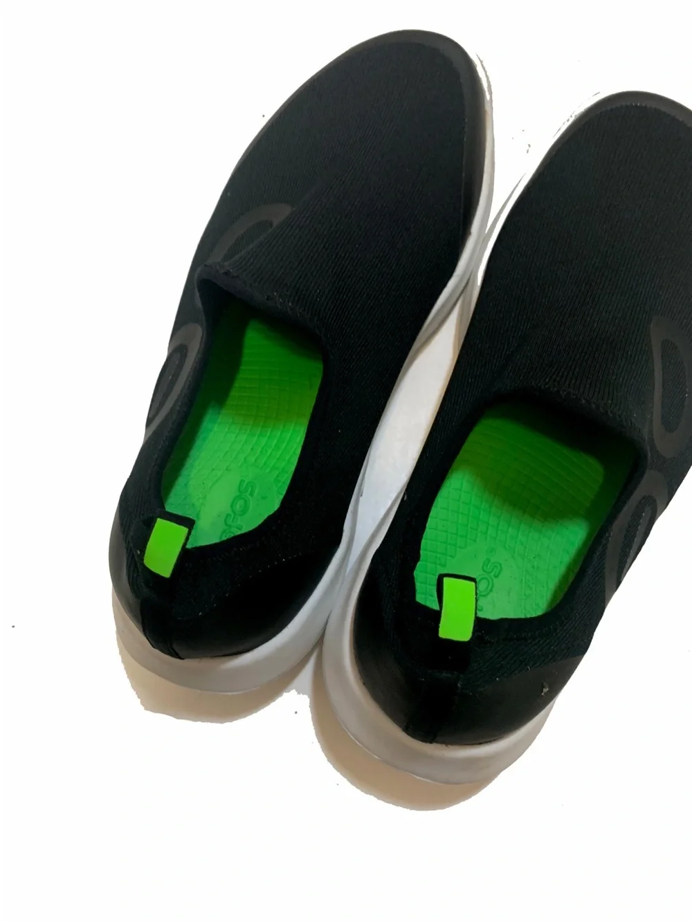 9 / OOFOS slip-on sneakers